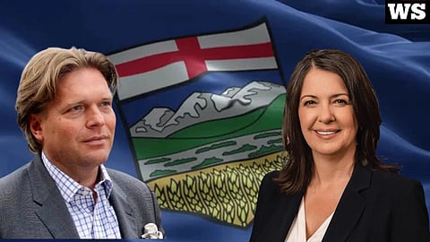 Danielle Smith and Thomas Lukaszuk in front of an Alberta flag.