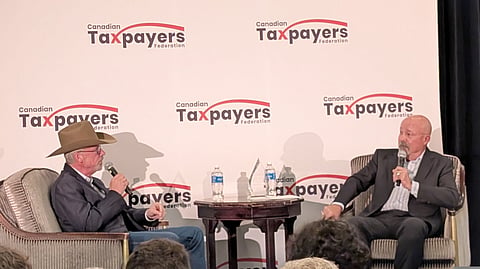 Brad Wall and John Gormley converse at the Hotel Saskatchewan, Oct. 16, 2025