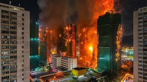A massive fire has erupted in an high-rise apartment complex in the Tai Po district of Hong Kong. 