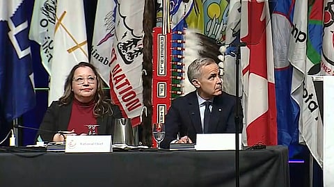 Cindy Woodhouse Nepinak (Left) Mark Carney (Middle)