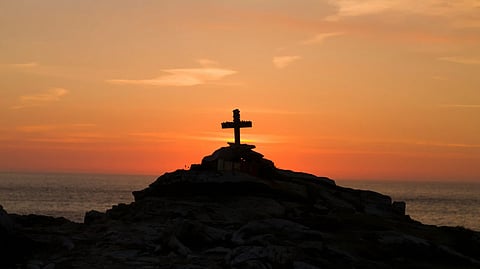 Cross in sunrise