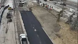 New pavement on 16 Ave, NW covers the Bearspaw water main break