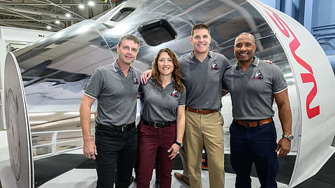The Artemis II crew posing in front of an Orion simulator on Jan. 23, 2026 at NASA’s Johnson Space Center in Houston, Texas. 
