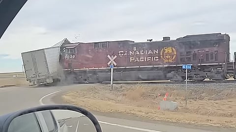 CP Rail train smashes into a semi truck near Taber, Alberta