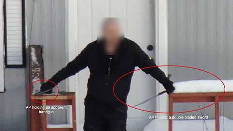 Man carrying a gun and a sword shortly before being shot to death by RCMP officers