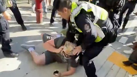 Teen gets restrained by Vancouver police during Scientology 'raid'