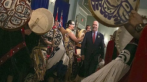 John Horgan is greeted by indigenous dancers as he is sworn in as premier at Government House in Victoria, July 17, 2017. One of his first acts was to order the UN Declaration on the Rights of Indigenous Peoples to be incorporated into BC law. 
