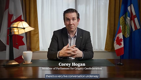 MP Corey Hogan delivering an address calling on Alberta federalists to be vocal advocates. 