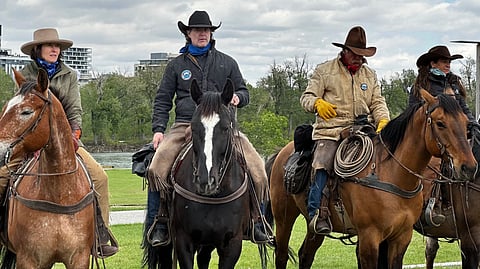 Corb Lund (centre) in Calgary on May 17, 2026. 