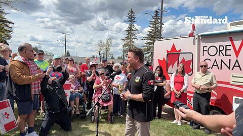 Thomas Łukaszuk surrounded by supporters at his Forever Canadian event. 