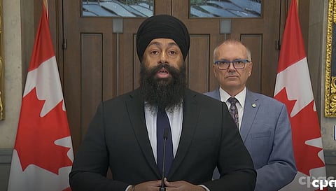 Jasraj Singh Hallan (center) 