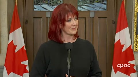 Christine Normandin speaking to reporters about Alberta's independence referendum