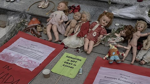 Items left at a Kamloops Residential School Memorial in Vancouver, May 30, 2021.