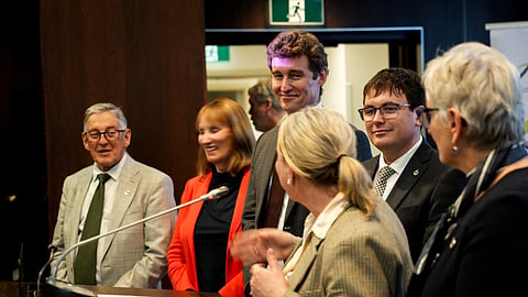 Yvan Baker (center) at committee