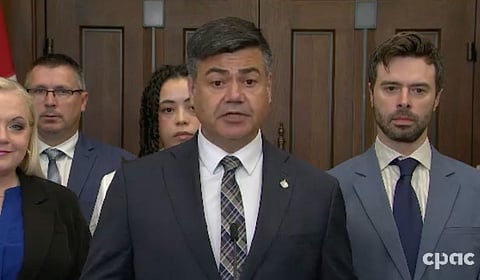 Corey Tochor speaking at a press conference. 