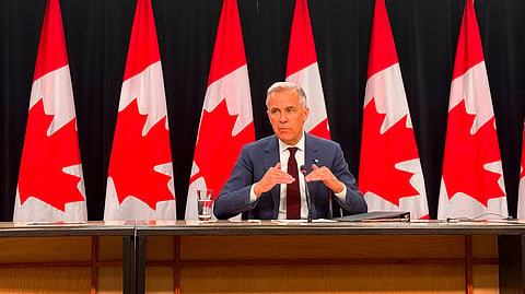 Prime Minister Mark Carney speaking to reporters in Ottawa