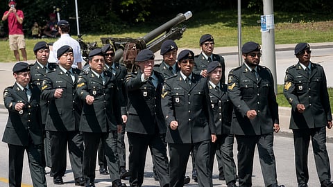 Footage showing reservists from the 7th Toronto Regiment marching during a Canada Day ceremony at Queen’s Park has drawn significant attention and criticism online.