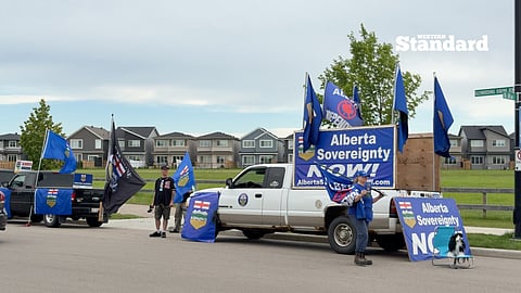 Alberta independence supporters protesting outside of the CPC BBQ in Edmonton. 