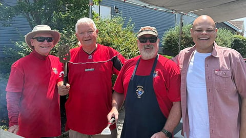 Jamil Jivani (far-right) attending local Canada Day celebration