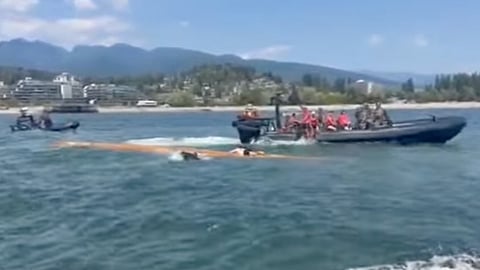 Eleven people, including several youths, were pulled from the waters of Burrard Inlet by RCMP officers Sunday afternoon after a large canoe overturned off the coast of West Vancouver.