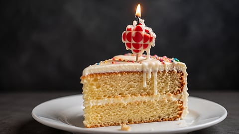 Birthday cake with melting CBC candle