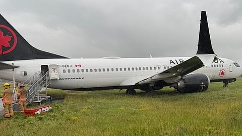 Air Canada Flight AC774 in the grass after veering off the runway at Montreal-Trudeau International Airport