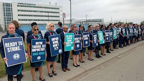 WestJet flight attendants vote for strike mandate