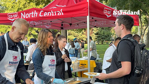 Danielle Smith srving pancakes at the Premier's Pancake Breakfast to kickoff KDays in Edmonton. 