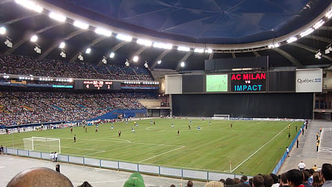Olympic Stadium hosting a soccer match between the Montreal Impact and AC Milan in 20210