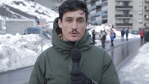 Cosmin Dzsurdzsa, communications director for the BC Conservative caucus, speaks during an outdoor interview.