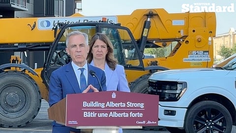 Prime Minister Mark Carney speaking in Red Deer at a press conference with Premier Danielle Smith. 