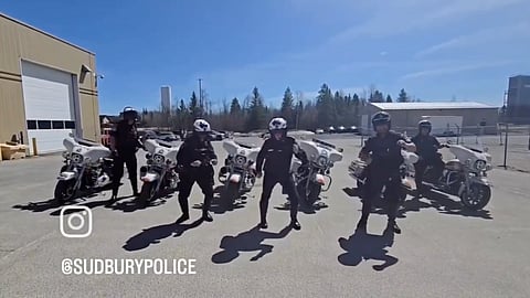Officers dance to the comedy sketch song as their city contends with crime and drug abuse