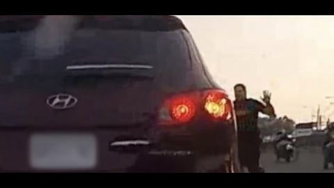 Video still of the maroon Hyundai SUV involved in the incident near the SkyTrain guideway between New Westminster and 22nd Street stations on Thursday.