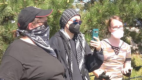 Far-left groups descended on the conference, clashing with police and hurling insults at attendees