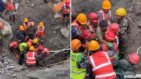 Two hydropower workers have been pulled alive from a debris-filled tunnel in Nepal