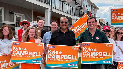 Alberta NDP Calgary-Shaw nominee Kyle Campbell, alongside Alberta NDP leader Naheed Nenshi, campaigning in the riding ahead of the Sept. 14 by-election. 