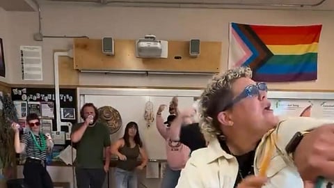 Still from an Esquimalt High School Instagram reel. Progress Pride flag at right.