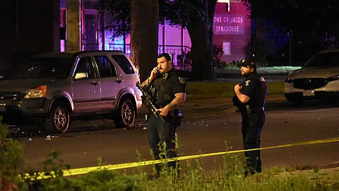 Officers outside of the Sons of Jacob Synagogue