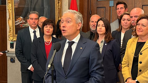 Finance Minister Champagne speaking to reporters on Parliament Hill