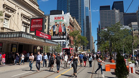 A crowd of people outside the Royal Alexandra Theatre in Toronto