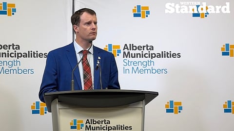 Association of Alberta Municipalities President Dylan Bressey speaking to reporters. 