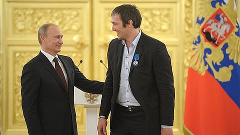 Vladimir Putin (left) with Alexander Ovechkin. 