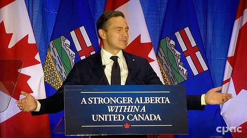 Conservative leader Pierre Poilievre speaking to an audience in Edmonton, calling on Albertans not to give up on Canada. 