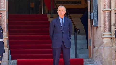Mark Carney awaits President of Vietnam at West Block (Mackenzie Doors)