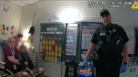 Bodycam footage shows an unnamed six-year-old before he is arrested after shooting his teacher 