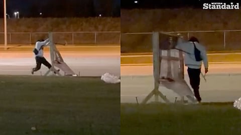 An Airdrie woman says a man chased her vehicle with a crowbar after she and her boyfriend caught him removing pro-Alberta independence signs just days before the October 19 referendum.