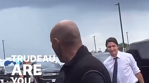 Protestor heckles Trudeau about vaccine injuries outside Hamilton event