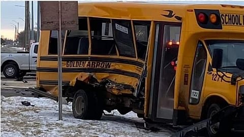 UPDATED: Three kids injured after garbage truck hits school bus in Spruce Grove