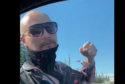 UPDATED WATCH: Enraged Calgary cyclist smashes cars window with his fist