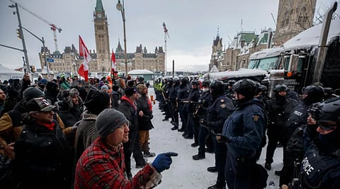 Credit union depositors who made Freedom Convoy protest signs were reported to police